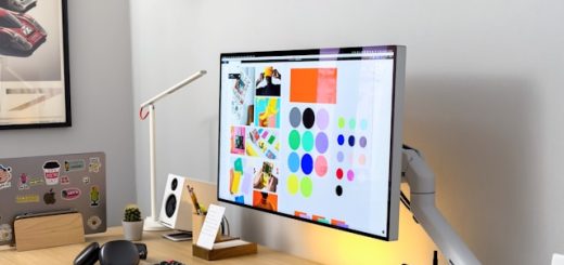 desk and computer screen at graphic design agency